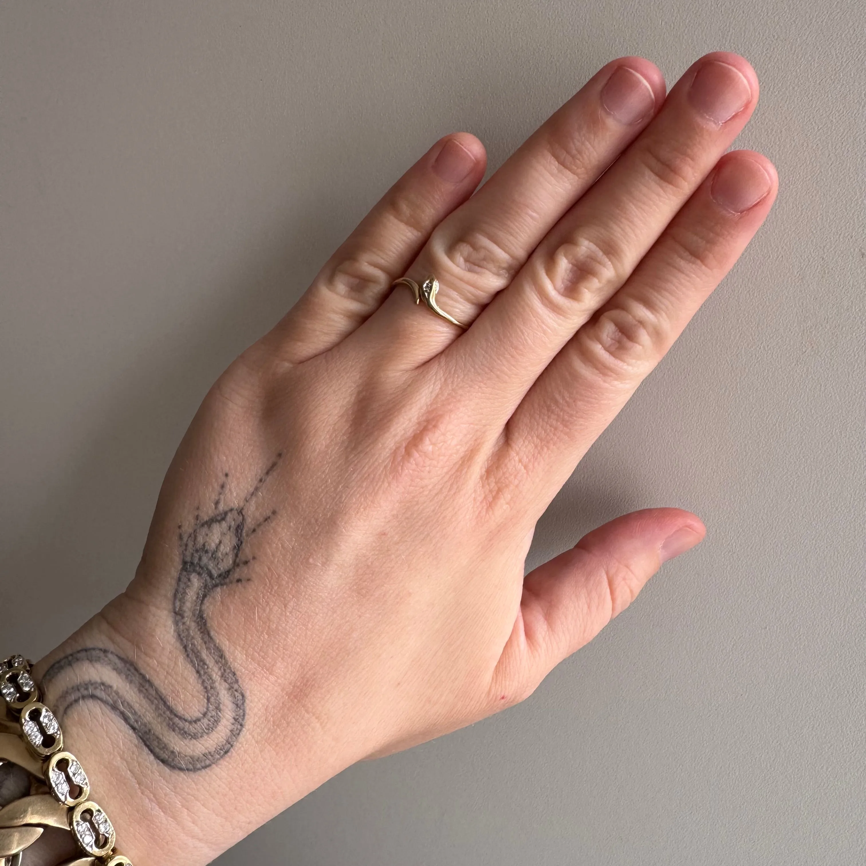 P R E - L O V E D // daintiest snake / 9k yellow gold and diamond curved snake band / size 5.25