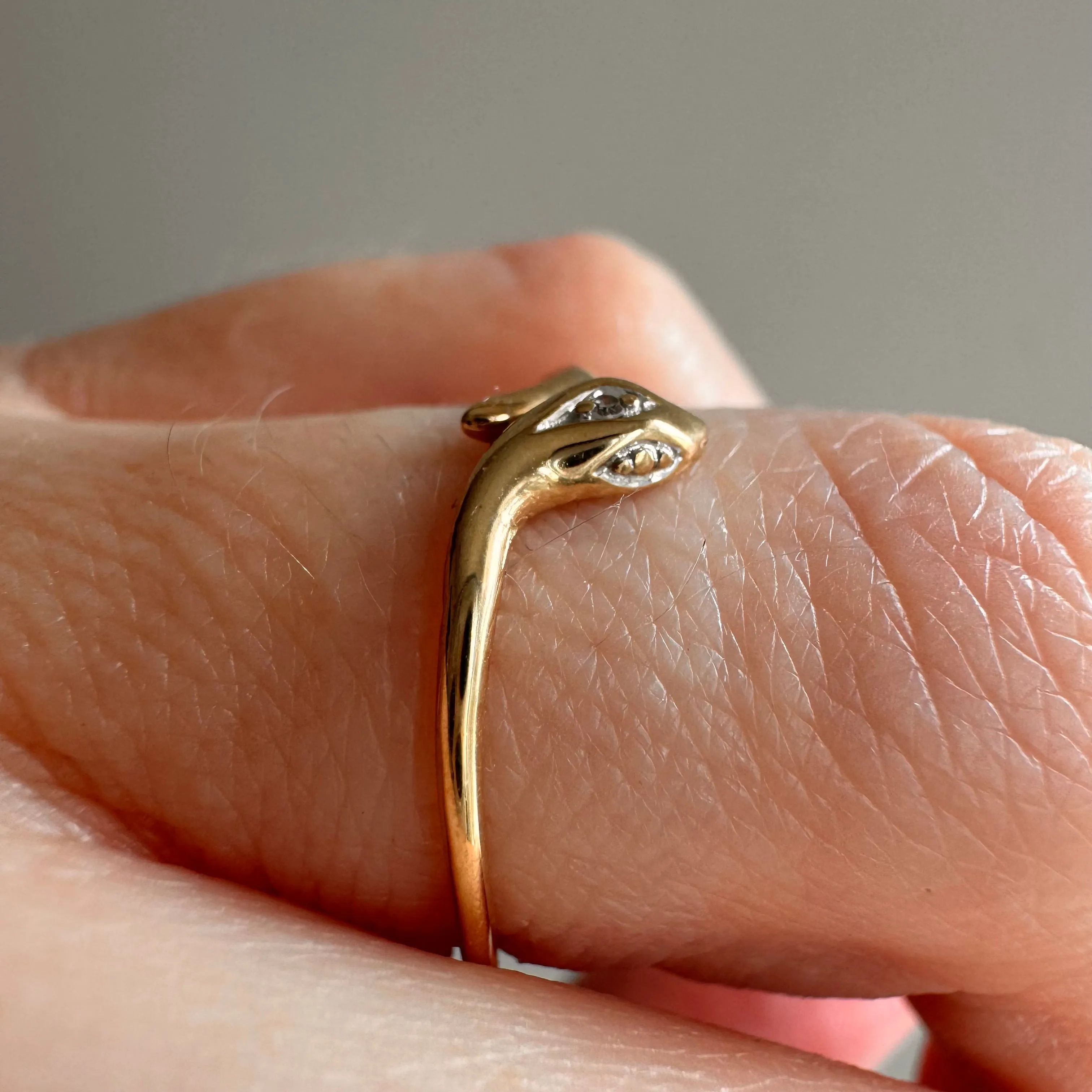 P R E - L O V E D // daintiest snake / 9k yellow gold and diamond curved snake band / size 5.25